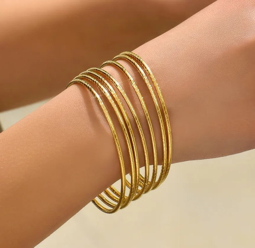 Isis Gold Bracelets